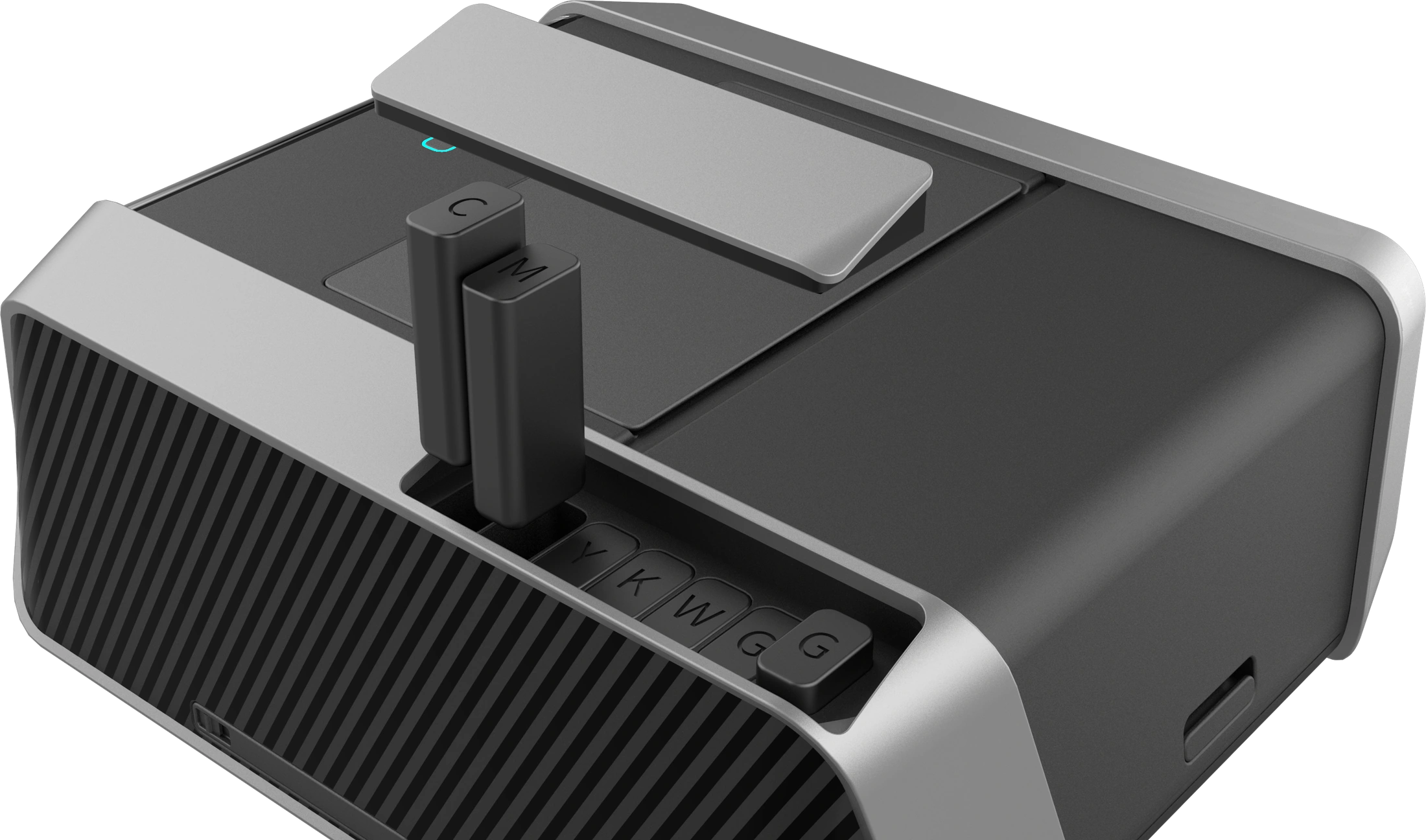 Detail of the printer with its ink compartment open and a cartridge lifted out